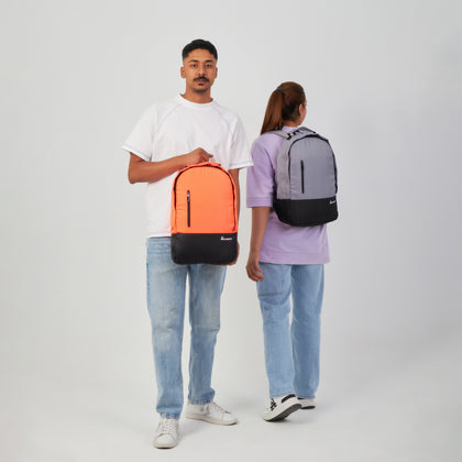 man and woman wear backpacks