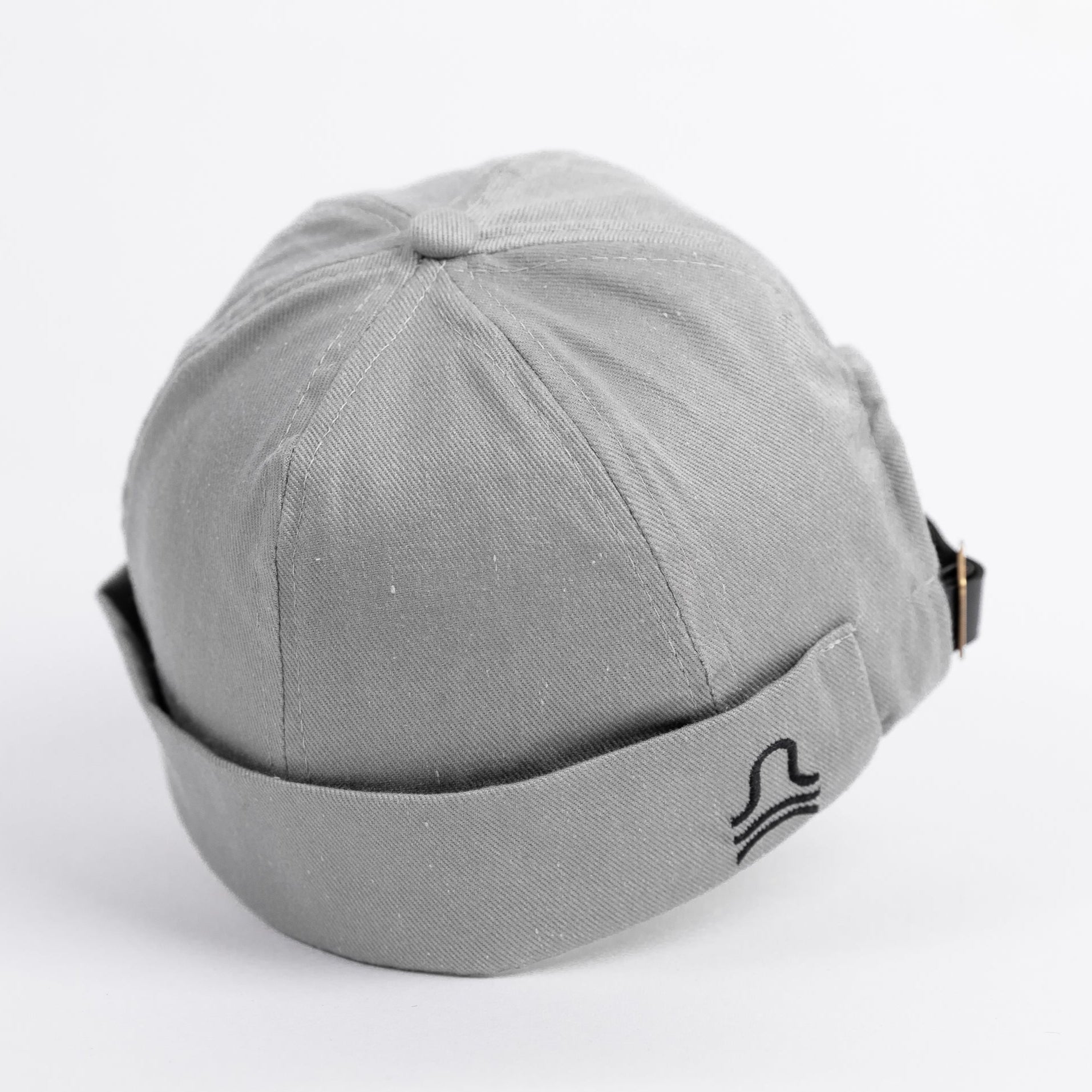 Gray cap with a logo on a white background