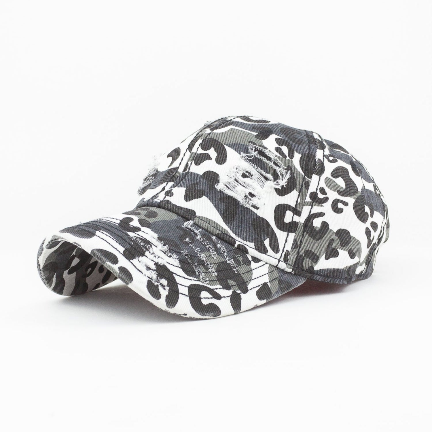 Camouflage-patterned baseball cap on a white background