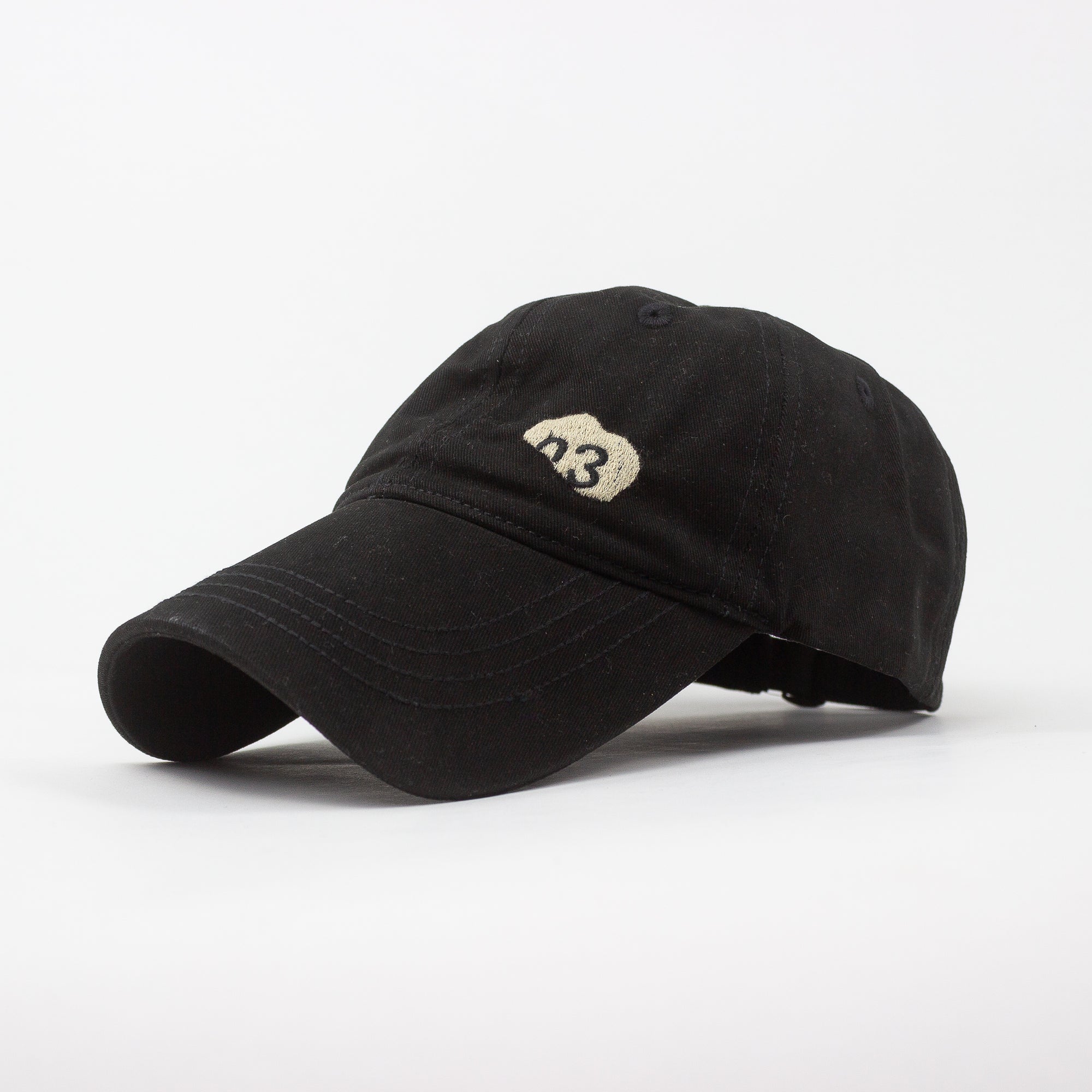 Black cap with a logo on a white background