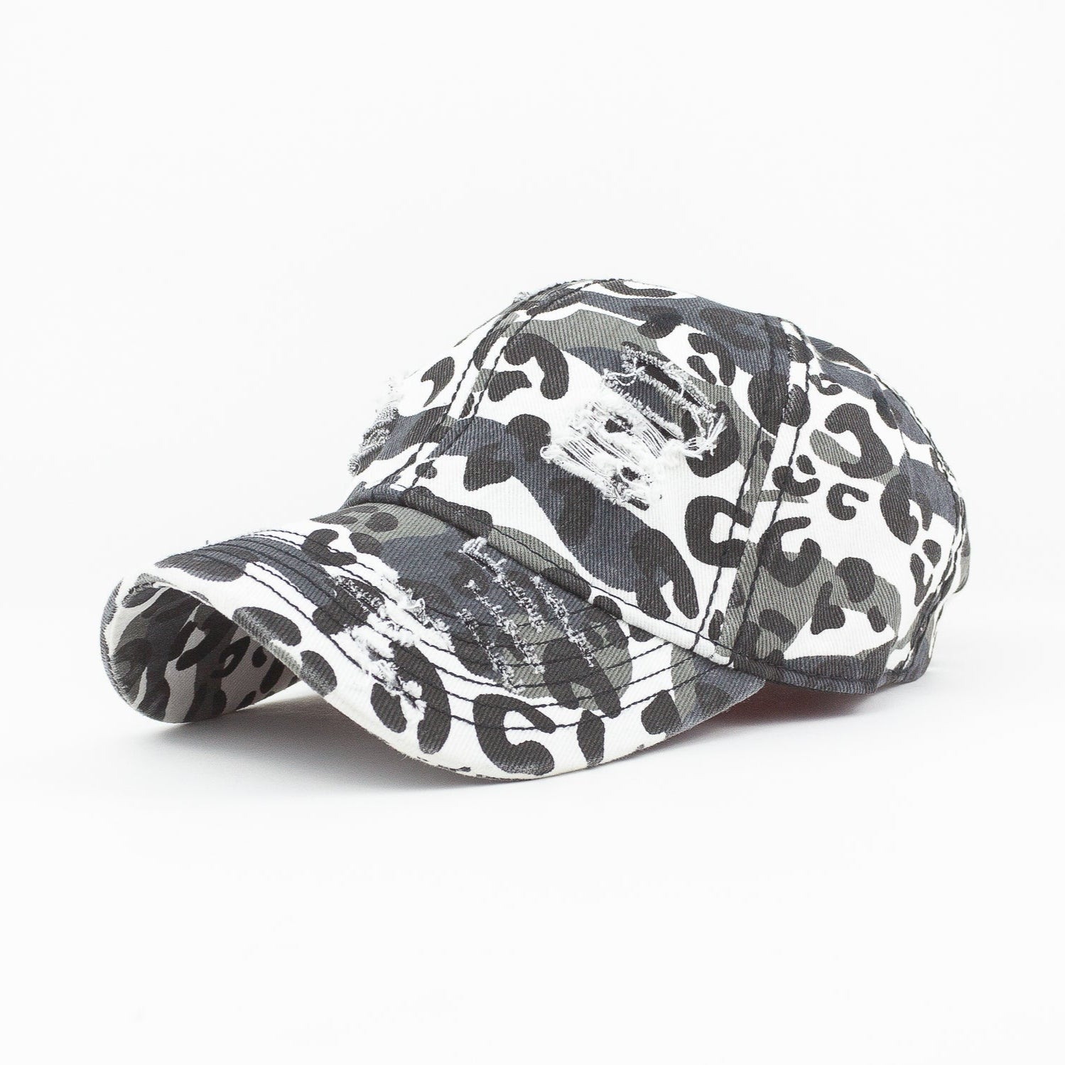 Camouflage-patterned cap on a white background