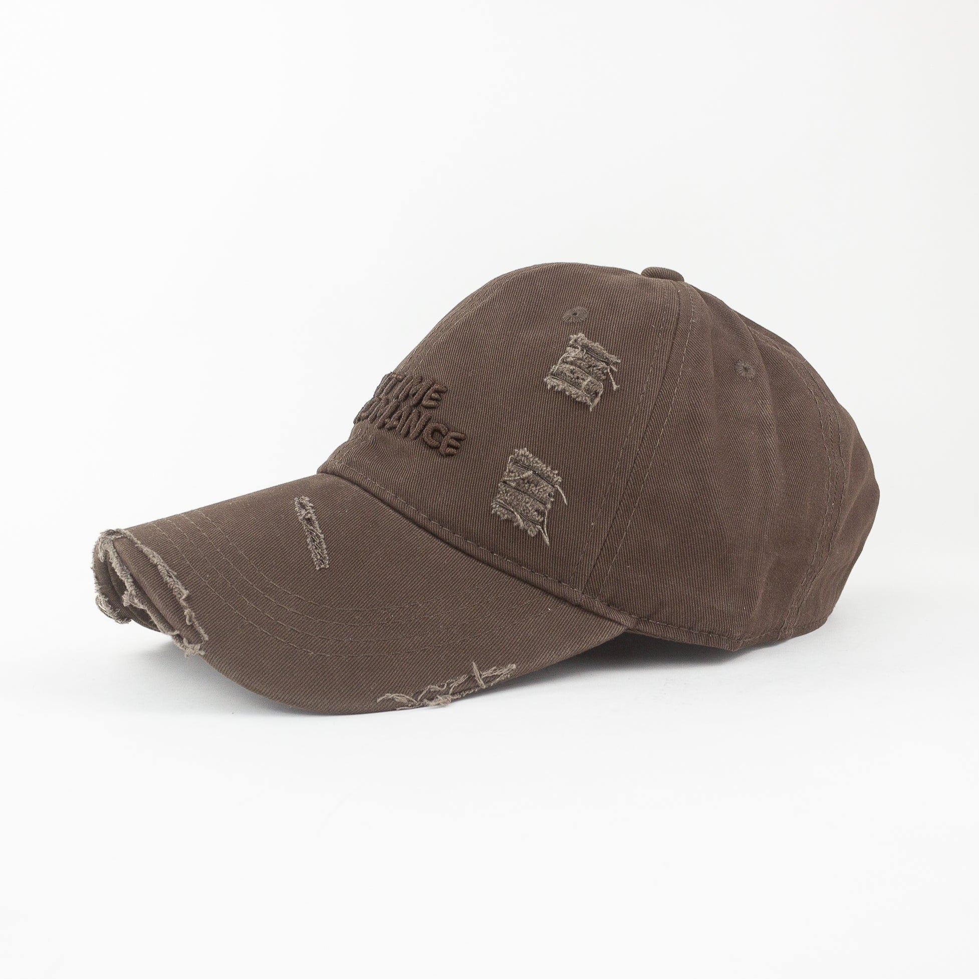 Brown distressed baseball cap on a white background