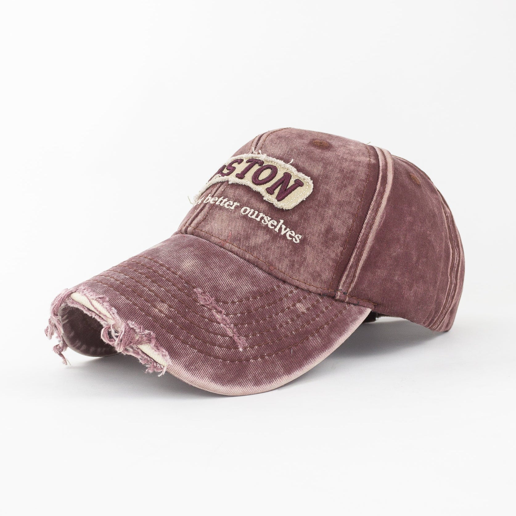 Vintage-style distressed cap with branding on a white background