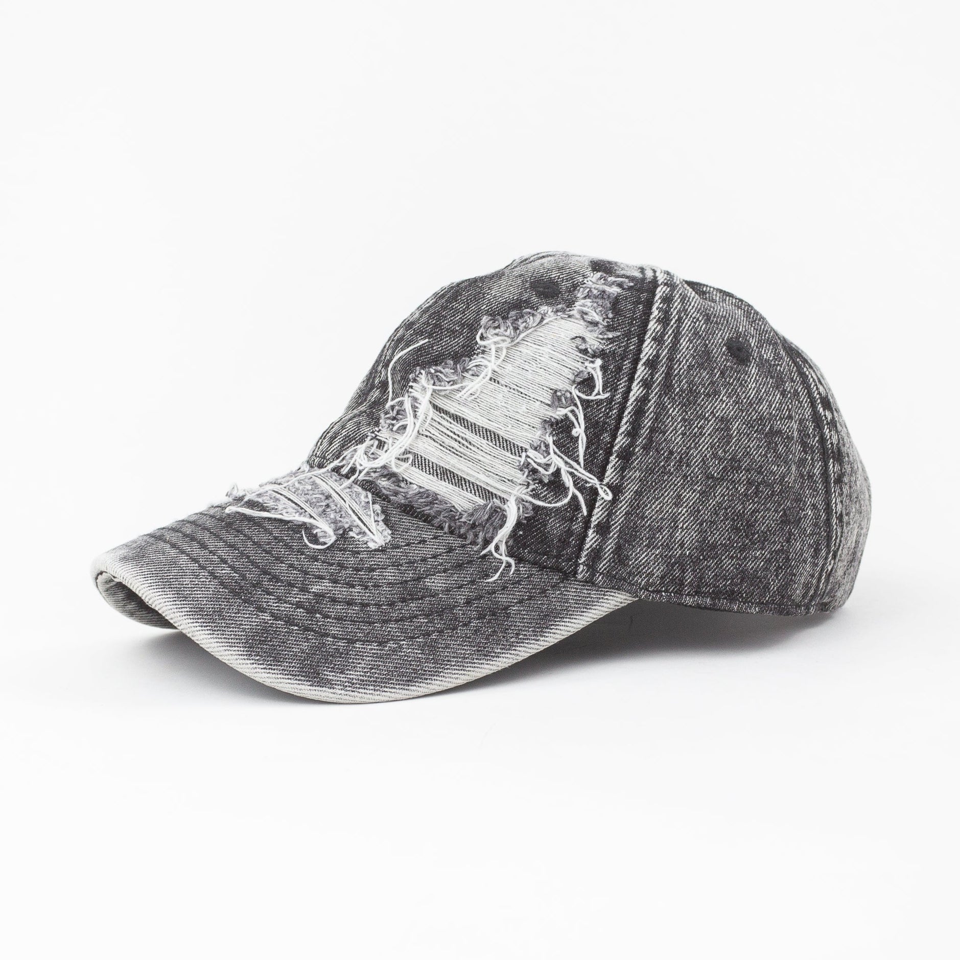 Distressed denim cap on a white background