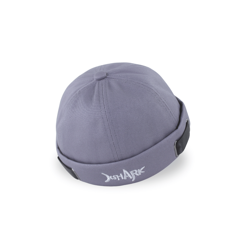 Profile view of a premium grey brimless docker hat for men with white embroidery and adjustable side straps